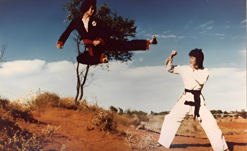 Martial Arts Grandmaster Felix Leong performs a flying kick in the Northern Territory Outback